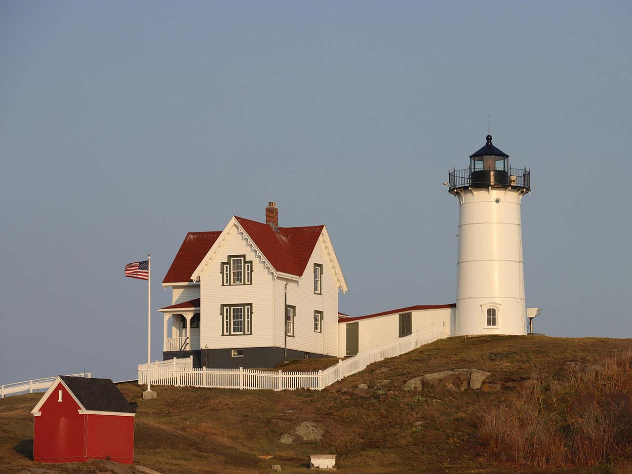 Nobska,Light,And,Red,Roof,House,In,Woods,Hole,On